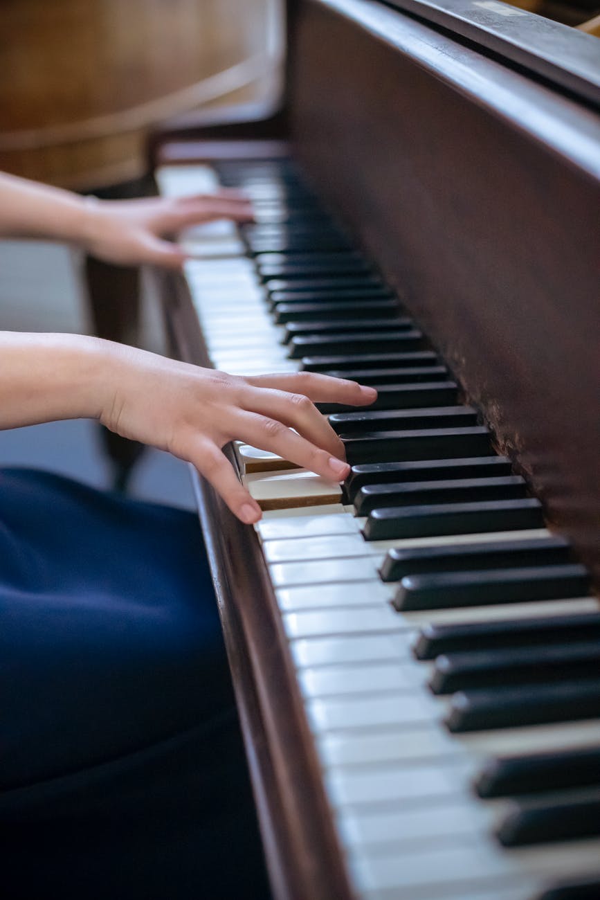 talented crop pianist playing melody