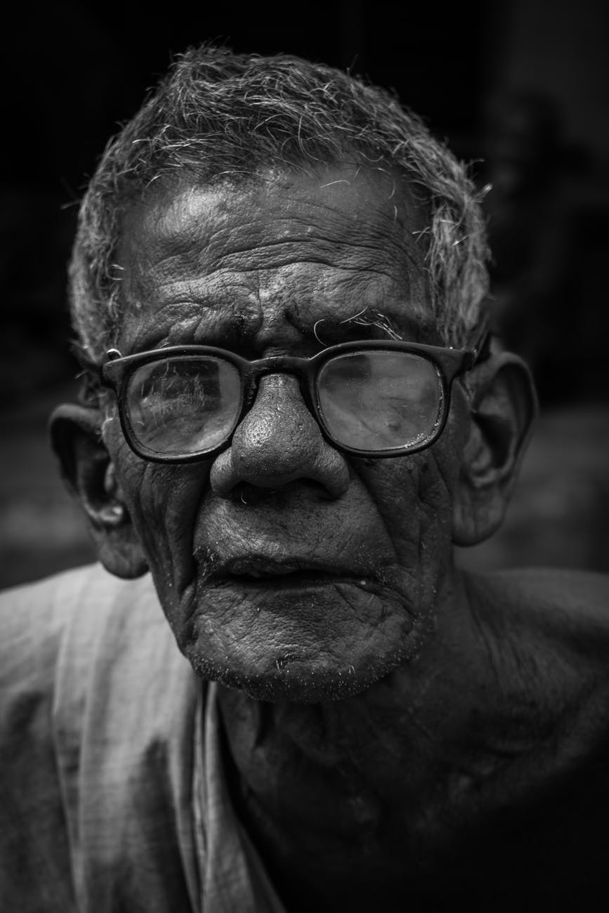 man wearing black framed eyeglasses